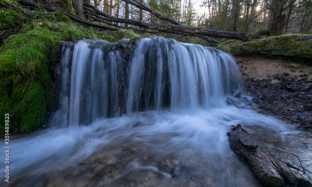 Fototapeta premium View of forest waterfall, deep forest waterfall landscape.