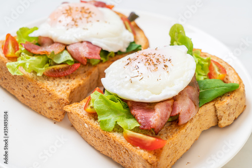 whole wheat bread toasted with vegetable, bacon and egg