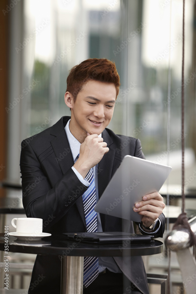 Businessman using digital tablet Businessman using digital tablet