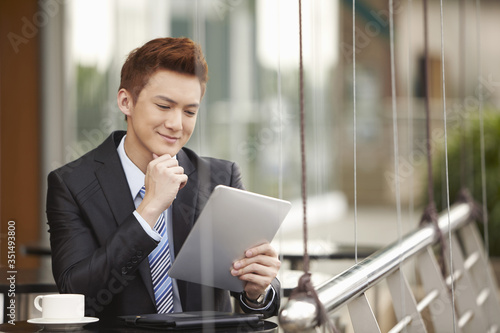 Businessman using digital tablet