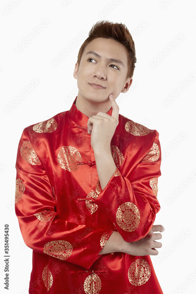 Man in traditional clothing contemplating Man in traditional clothing contemplating