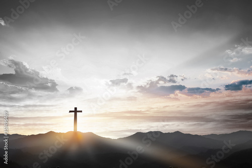 Billede på lærred Christmas concept: Crucifixion Of Jesus Christ Cross At Sunset
