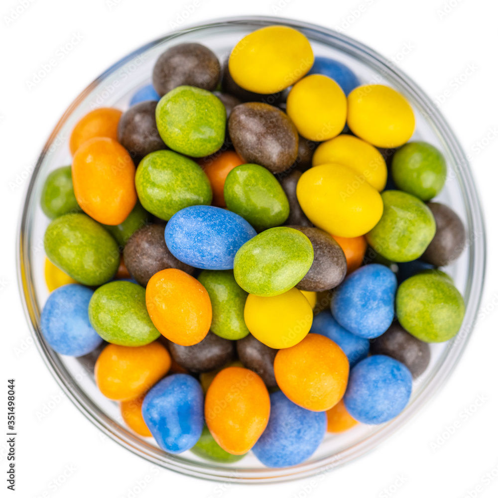 Chocolate coated peanuts isolated on white Chocolate coated peanuts isolated on white