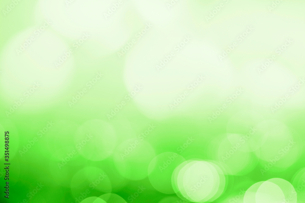 Obraz premium Bokeh pattern on a green background