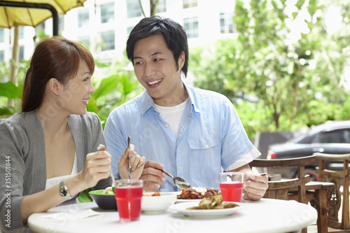 Man and woman having a meal together
