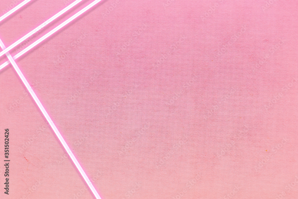 Glowing neon line on a pink background