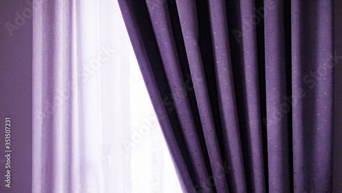 purple curtain with a window