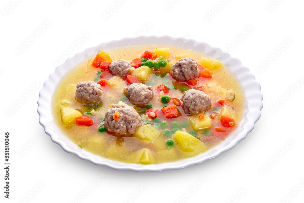 Meatballs with green peas in the potato soup Meatballs with green peas in the potato soup