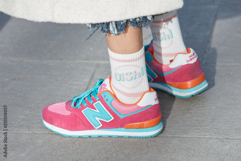 Woman with pink and blue New Balance shoes on January 14, 2017 in Milan,  Italy Stock Photo | Adobe Stock
