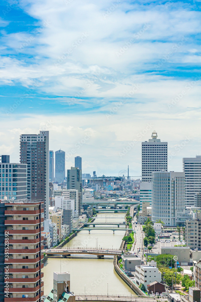 Fototapeta premium 土佐堀川と大阪の街