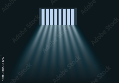 Concept de la prison et de la privation de liberté avec la lumière du jour qui éclaire l’intérieur d’une cellule au travers des barreaux de la fenêtre. photo