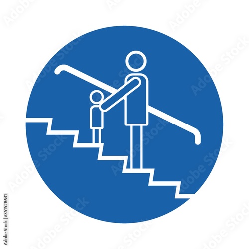 adult and children on escalator