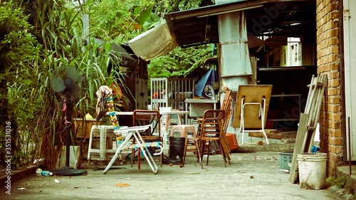 Wallpaper Mural brick wall at the side with chairs at the side Torontodigital.ca