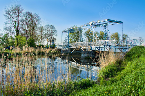 Old drawbridge in Poland. Beautiful spring landscape.