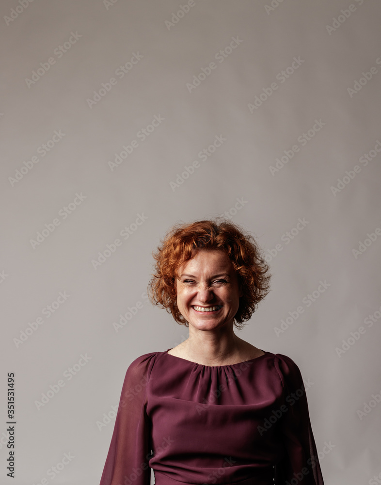Happy red-haired woman. Laughter. Good vibes. Happy red-haired woman. Laughter. Good vibes.