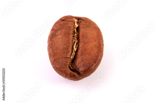 group of isolated roasted coffee beans, close up. 