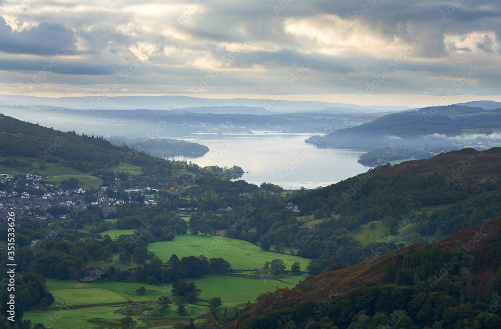 Lake Windermere and Ambleside set amongst the green pastures and mountains of the Lake District.