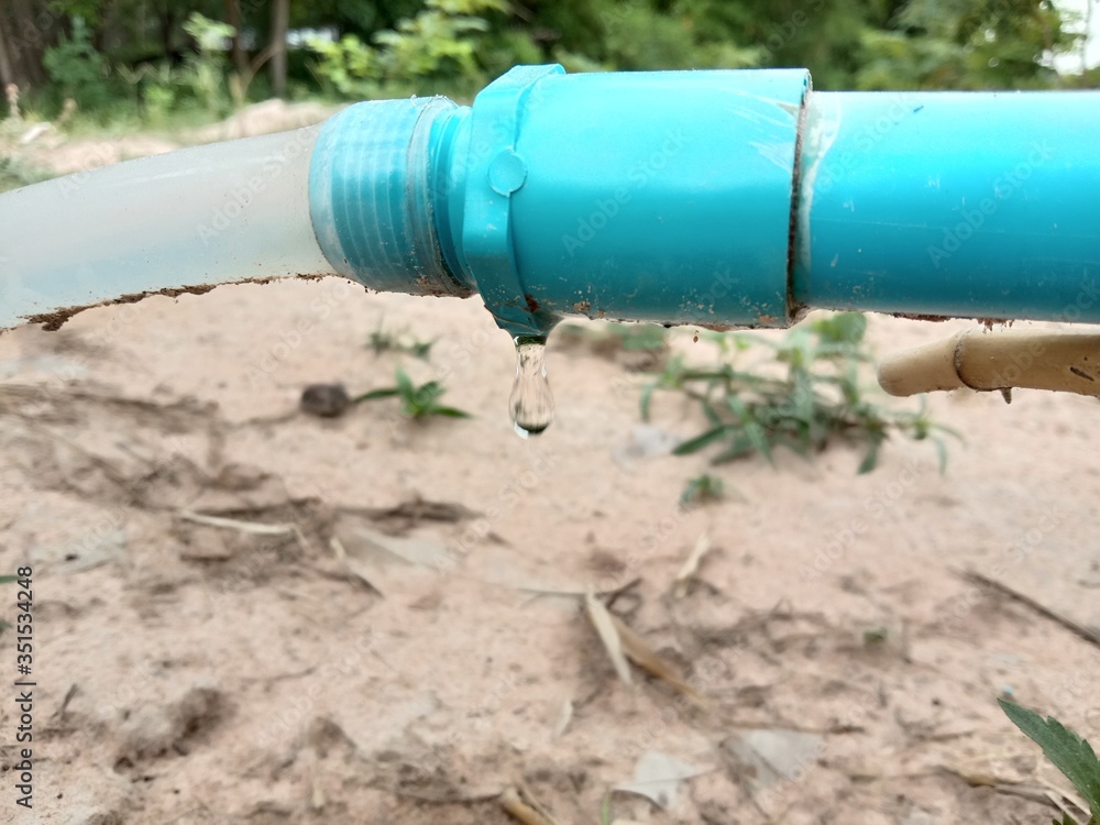 Blue PVC pipes with water drops Blue PVC pipes with water drops