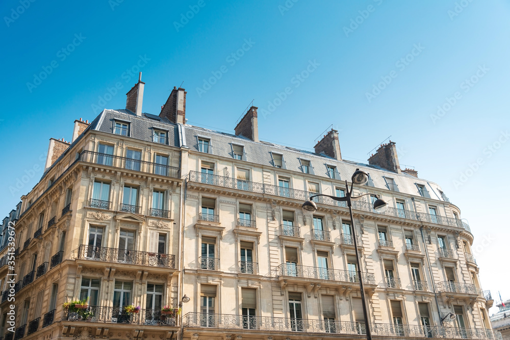 Antique building view in Paris city, France