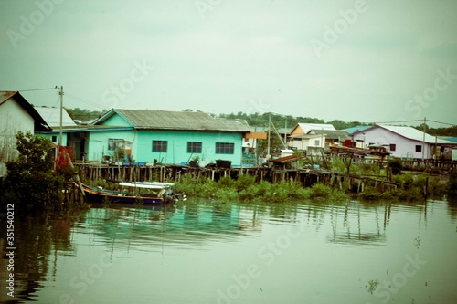 Rows of colorful houses by the river