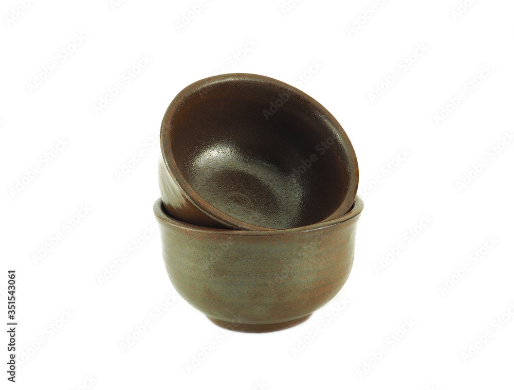 Empty brown bowl stack isolated on a white background.. Empty brown bowl stack isolated on a white background..
