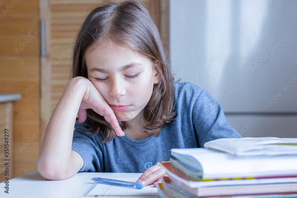 The child fell asleep from boredom while doing homework The child fell asleep from boredom while doing homework