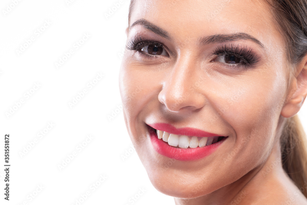 Fototapeta premium Face of an attractive and beautiful young woman in close up