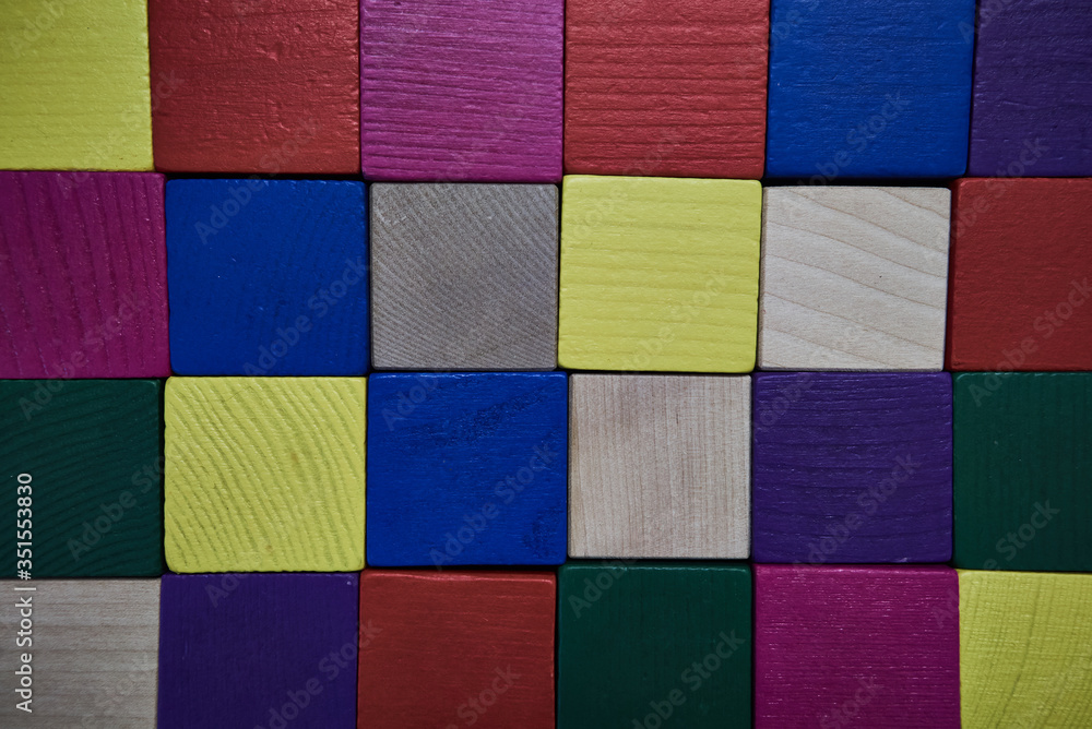 colored wooden cubes for development and play at home