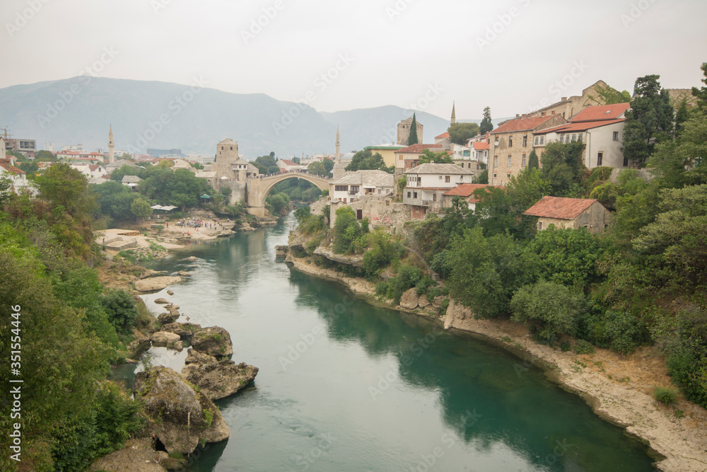 Stari Most, also known as Mostar Bridge, is a rebuilt 16th-century Ottoman bridge in the city of Mostar in Bosnia and Herzegovina that crosses the river Neretva and connects the two parts of the city
