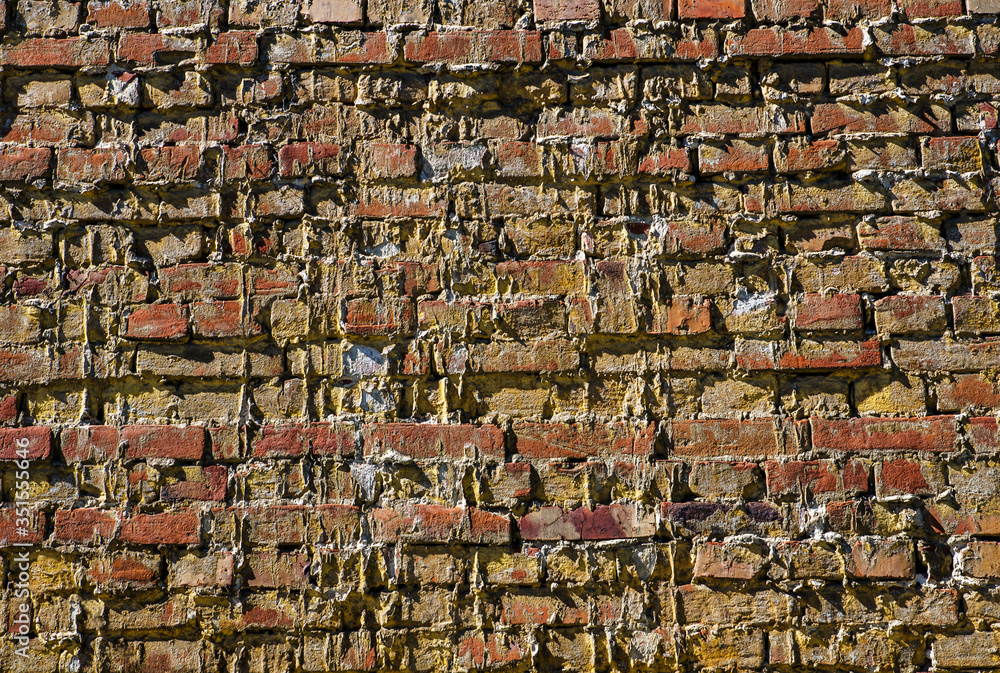 Light brown textured brick wall is good for background