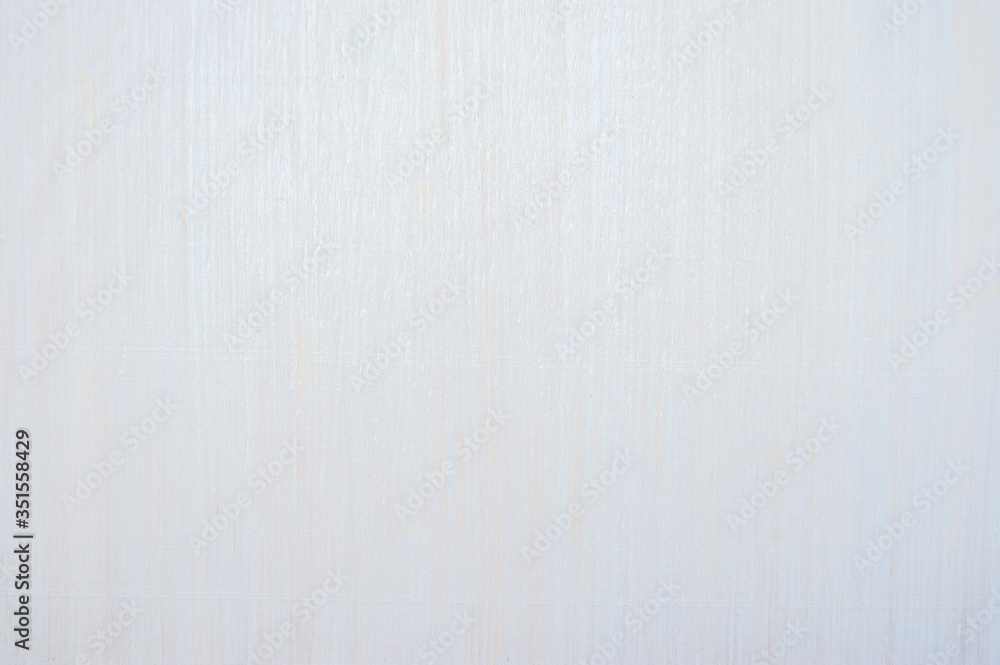 Wooden background covered with white paint. The tree texture is visible. Background and texture Wooden background covered with white paint. The tree texture is visible. Background and texture