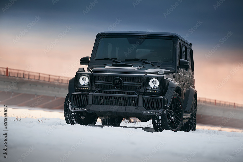 Mercedes Benz Brabus G Class Widestar W463 at the snow field. Gelentwagen  Photos | Adobe Stock