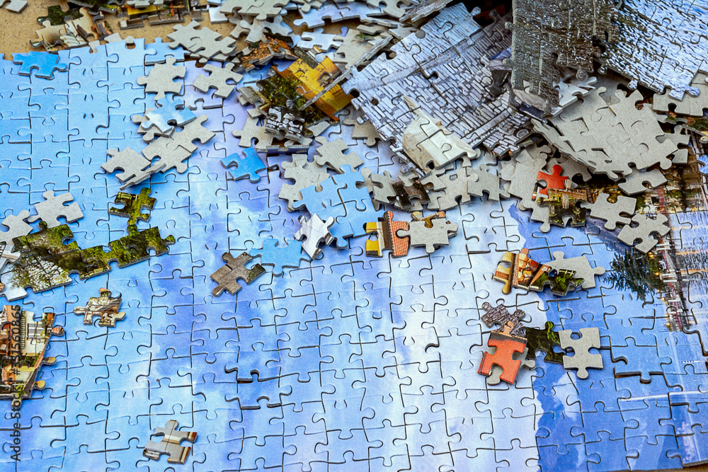 Naklejka premium The picture from the puzzles is partially disassembled.