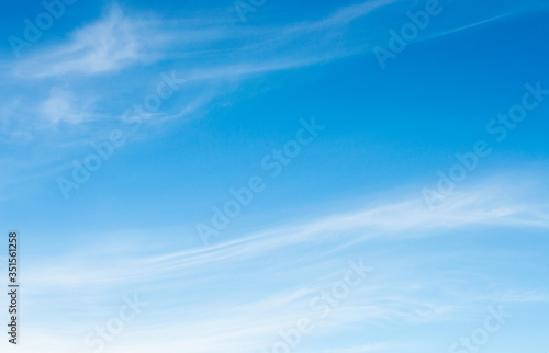 Fototapeta Naklejka Na Ścianę i Meble -  Bright blue sky with blurred clouds on a Sunny day.