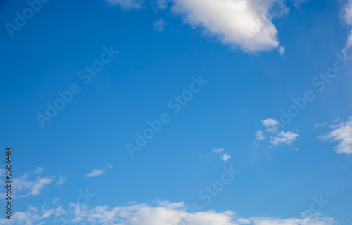 Blue sky with white clouds, background
