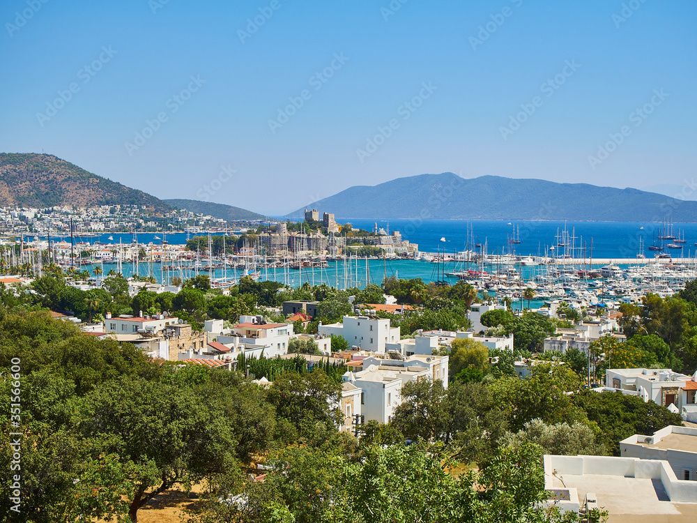 Bodrum, Mugla Province, Turkey. Kumbahce bay with the Castle of Saint Peter in the background. Bodrum, Mugla Province, Turkey. Kumbahce bay with the Castle of Saint Peter in the background.