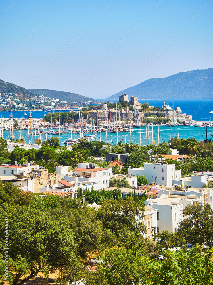 Bodrum, Mugla Province, Turkey. Kumbahce bay with the Castle of Saint Peter in the background.