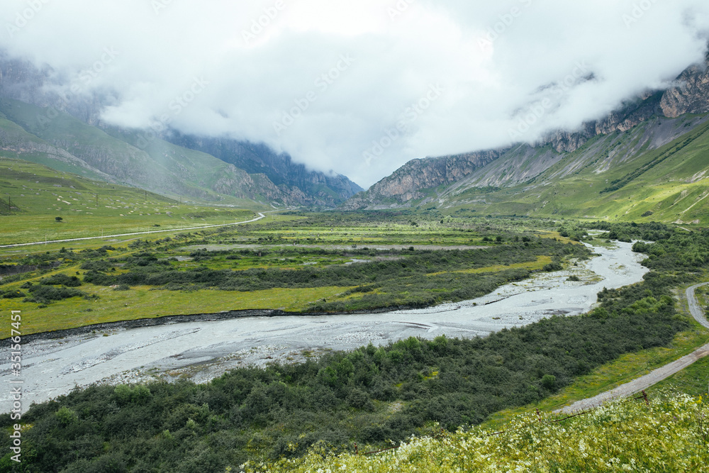 Green summer mountains landscape in Dargavs, North Ossetia - Alania, Caucasus, Russia Green summer mountains landscape in Dargavs, North Ossetia - Alania, Caucasus, Russia
