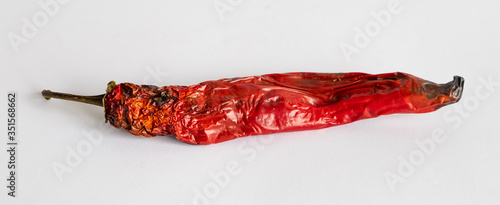 Quadro su tela Bad tainted chili pepper