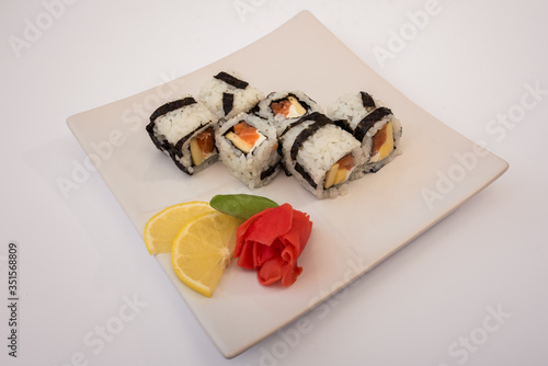  sushi in a plate on a white background