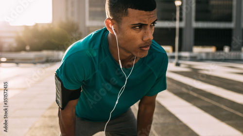 Motivated and focused runner photo