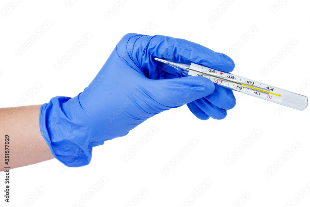Mercury thermometer in hand isolated. High temperature