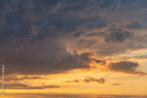 orange sunset sky with lighted clouds © Alrandir
