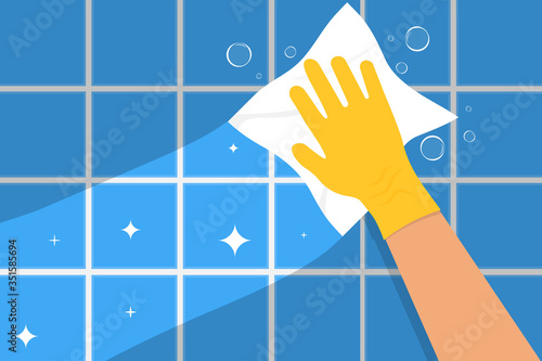 Hand cleaning bathroom tile. Clean concept. Yellow gloved hand. Vector drawing.
