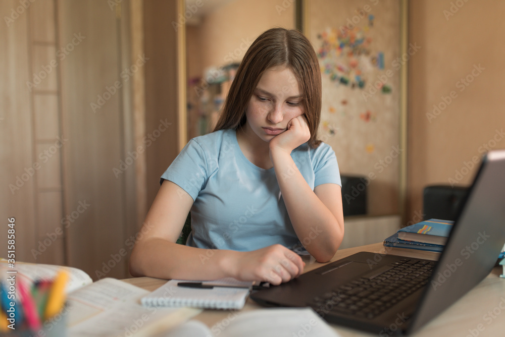 Φωτογραφία Teenager girl is sad tired, bad and depression, bad test lesson, home electronic education, laptop watching videos, conference Internet