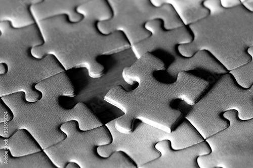 missing puzzle piece, jigsaw. in black and white.