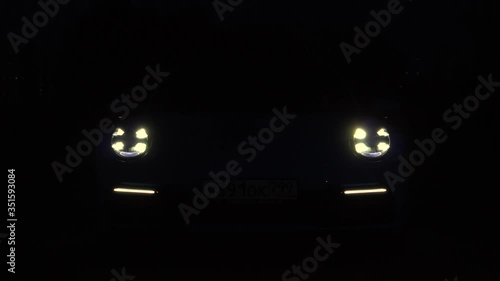 Lights come on in the dark. the round lamps burn brightly. Light in the dark.