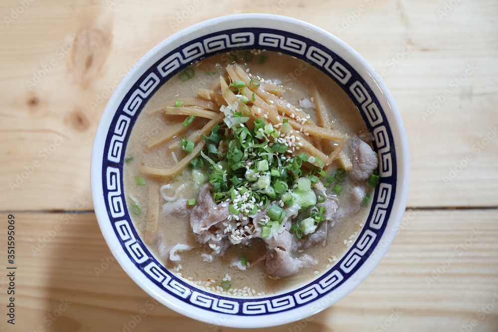 Ramen Japanese noodle soup food with noodle and pork on wooden table Ramen Japanese noodle soup food with noodle and pork on wooden table