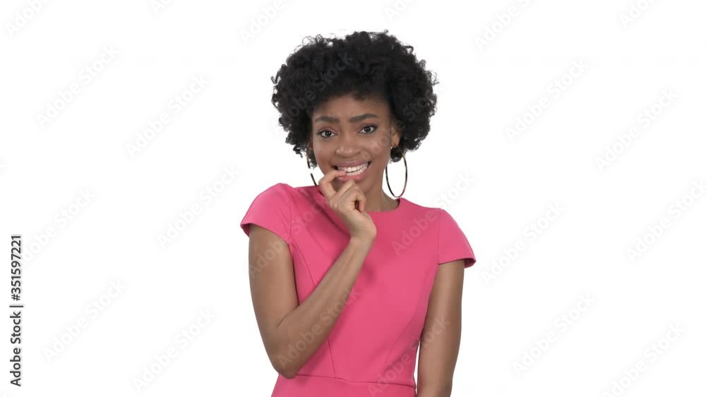 Woman touching her lips. Model with perfectly white teeth. Hesitating emotion expression. Isolated, on white background Woman touching her lips. Model with perfectly white teeth. Hesitating emotion expression. Isolated, on white background