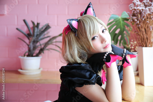 Japan anime cosplay , portrait of girl cosplay in pink room background